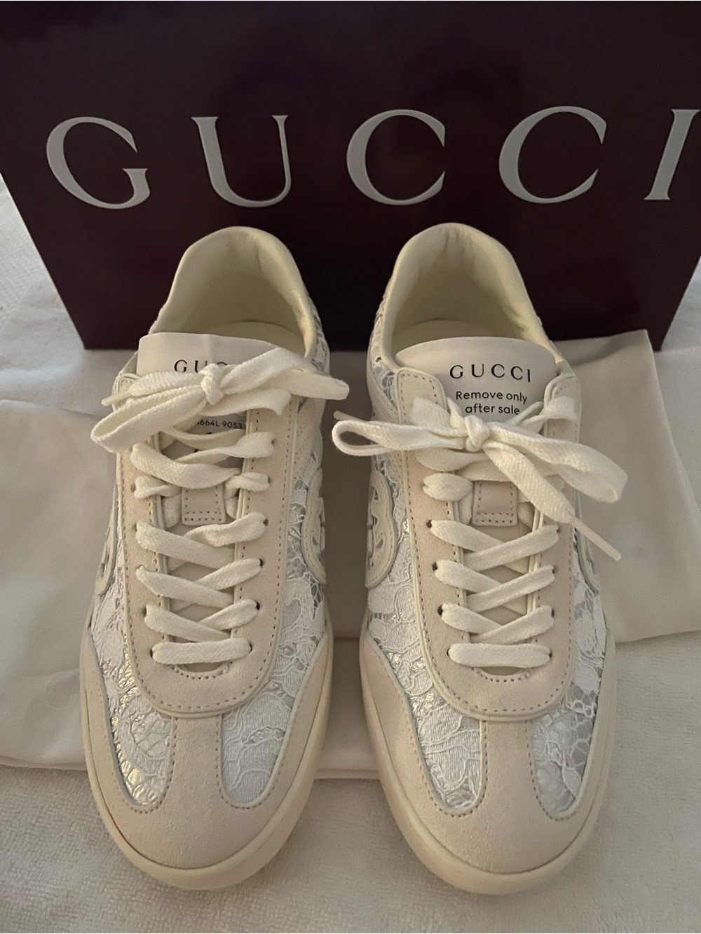 Brand new and Never used Gucci G75 Suede White Low Top Sneakers